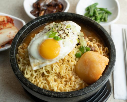 Open Rice ramen bowl with sides Blakeney Town Center Charlotte, NC